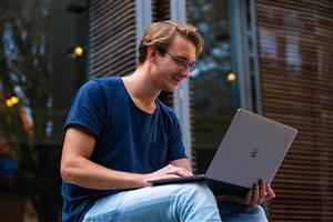 Man Outside with Laptop